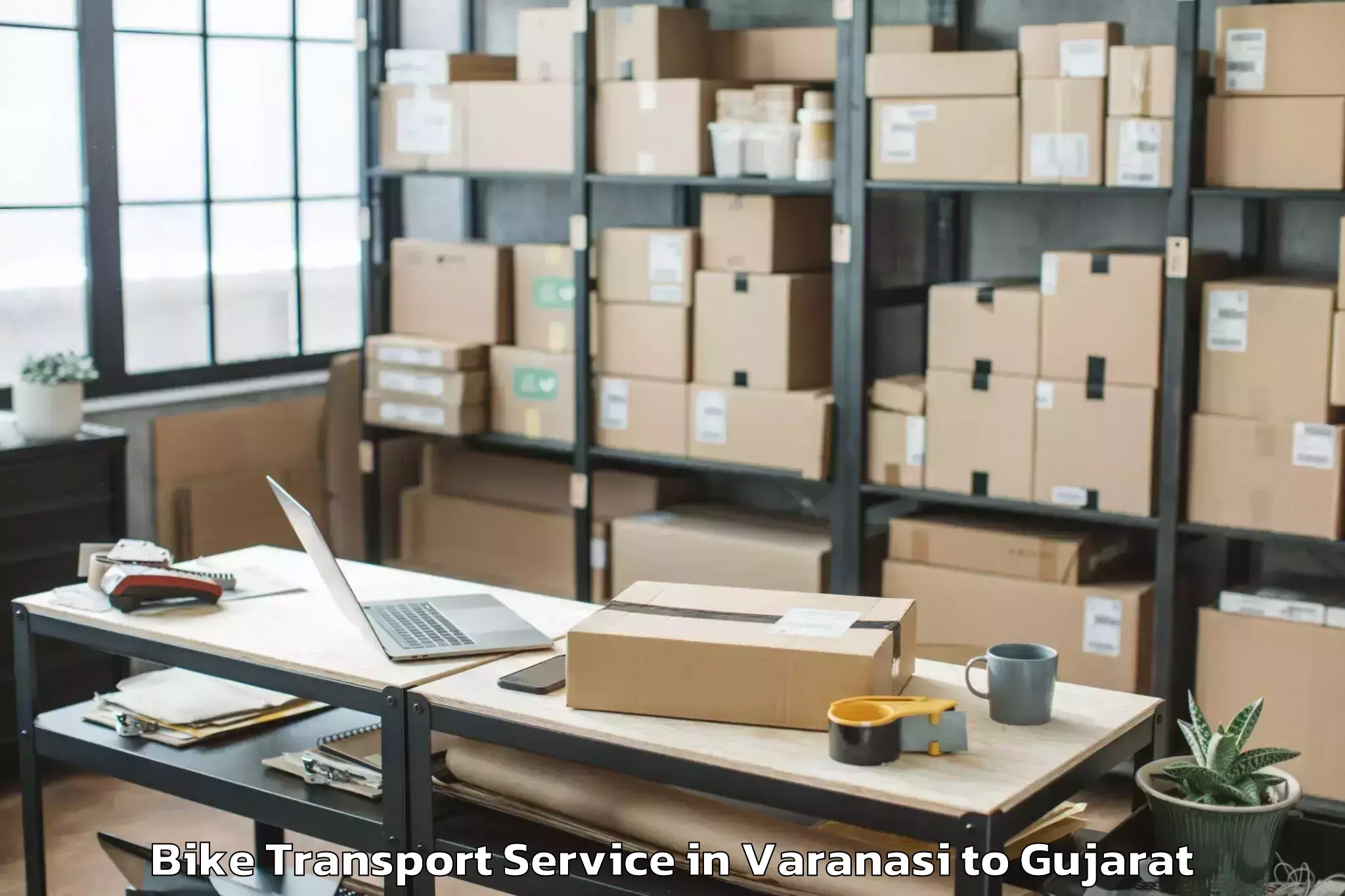 Book Varanasi to Gadhada Bike Transport Online